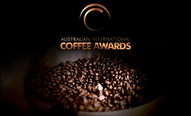 Australian International Coffee Awards logo with coffee beans