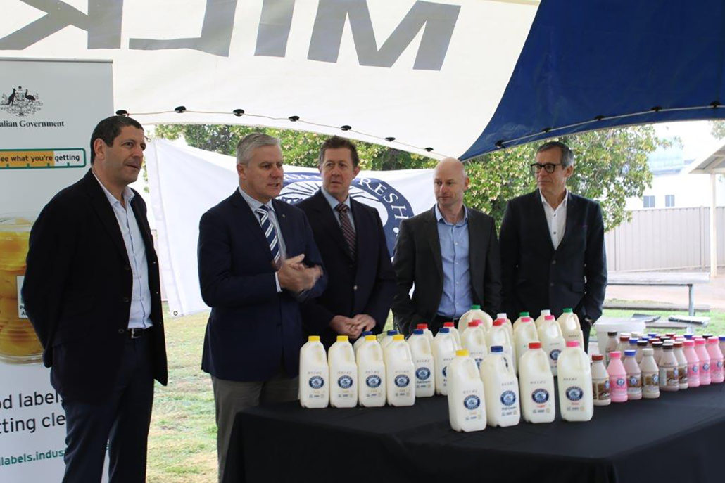 A table stocked with Riverina Fresh milk